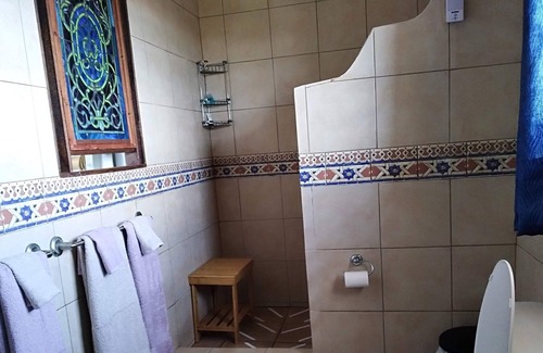 Tejas House | Enjoy ocean views and breezes as you relax in one of the hammocks on the deck