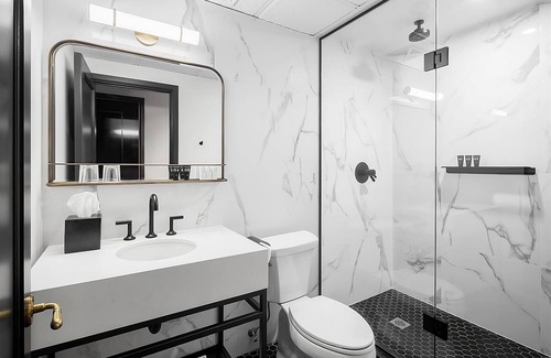 Riverside Hotel | Enjoy Skyline Views from the Rooftop Bar! 4 Comfortable Units, Coffeehouse