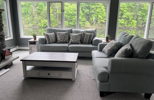 Saugerties South House | Escape to a stunning two-story home nestled on serene Esopus Creek in Saugerties