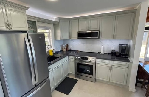 Point Blanche Apartment | Escape to Tranquility 2-bedroom modern home at waterfront with fast Internet.