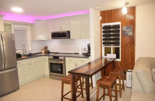 Point Blanche Apartment | Escape to Tranquility 2-bedroom modern home at waterfront with fast Internet.