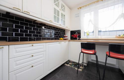 Bialoleka Apartment | Exceptional Apartment in Warsaw with Parking by Noclegi Renters