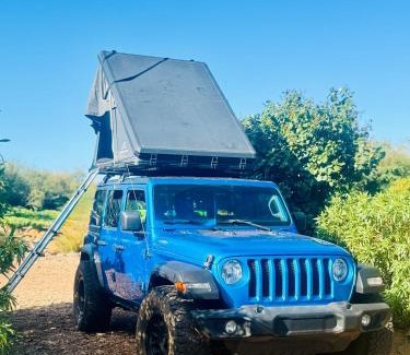 Paia Other | Explore Maui's diverse campgrounds and uncover the island's beauty from fresh perspectives every day as you journey with Aloha Glamp's great jeep equipped with a rooftop tent