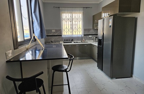 Lusaka Villa | Family & business friendly solar powered luxury 2 bed home with private pool