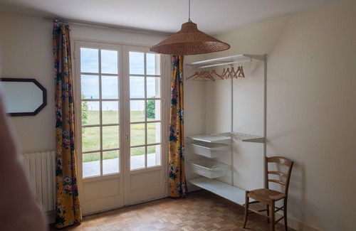 Ambon House | Family home with the ocean at the end of the garden.