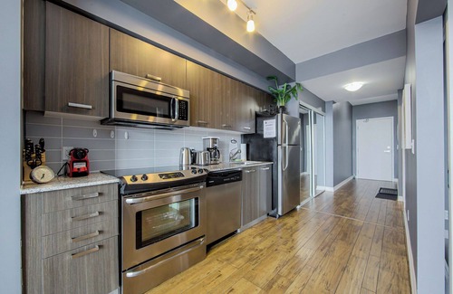 Bay Cloverhill Condo | Family Size 1 Bedroom Condo with BALCONY walk to SICK KIDS HOSPITAL. Sleeps 4