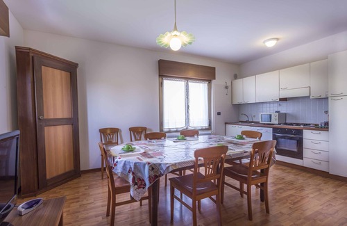 Palazzolo dello Stella Apartment | Fattoria 2, spacious apartment in the farm courtyard