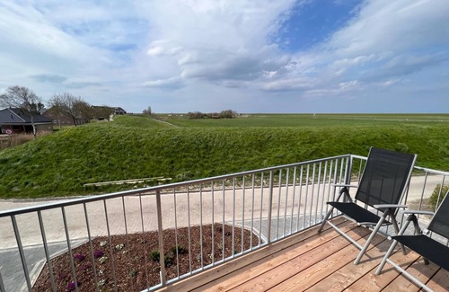 Neßmersiel Apartment | Ferienwohnung Hafenblick