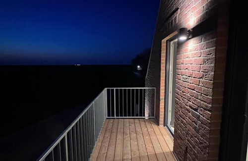 Neßmersiel Apartment | Ferienwohnung Hafenblick