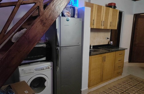 Bouvet Island Apartment | First-floor bedroom, Bathroom, kitchen.nSecond-floor bedroom, Living room and TV