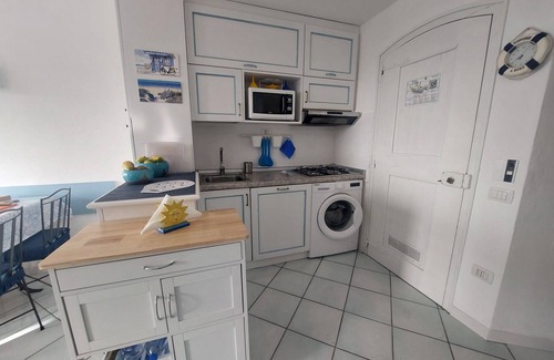 Canneddi Apartment | Flat with sea view terrace in holiday village near Isola Rossa