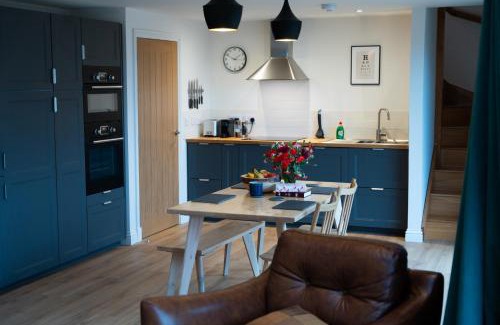 West Laroch House | Forest Corner Luxury Home with Hot Tub