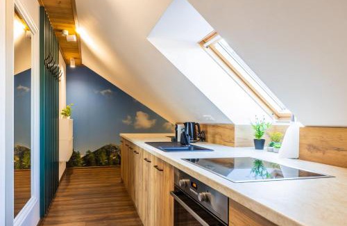 Velka Lomnica Apartment | Forest oasis - mountain attic in High Tatras