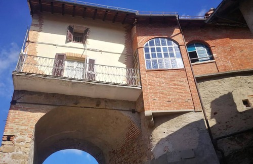 Castelletto d'Orba Apartment | Former military outpost watchtower at the entrance to the village.