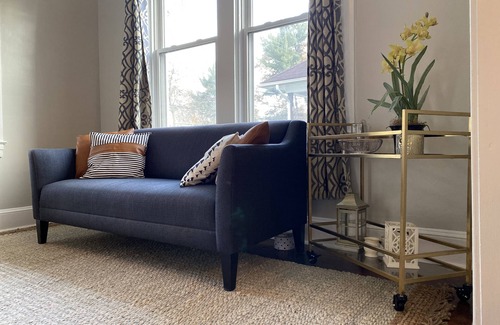 Elkridge House | Four bedrooms, porch and parking! Pet-friendly with a large fenced yard.