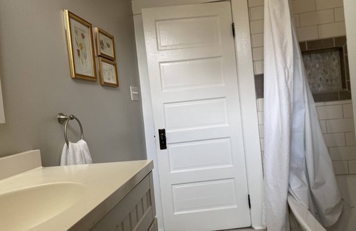 Elkridge House | Four bedrooms, porch and parking! Pet-friendly with a large fenced yard.