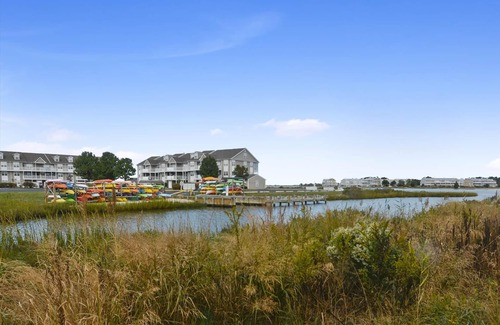 Ocean View Condo | FREE DAILY ACTIVITIES INCLUDED! Only a few miles from Bethany Beach this beautifully decorated second floor unit offers 2 bedrooms with 2 full baths and is nestled within unspoiled land and gently lapping inland waterways