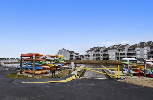 Ocean View Condo | FREE DAILY ACTIVITIES INCLUDED! Only a few miles from Bethany Beach this beautifully decorated second floor unit offers 2 bedrooms with 2 full baths and is nestled within unspoiled land and gently lapping inland waterways