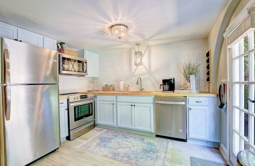 Lusby House | Garden Cottage · Garden Cottage - Fire Pit and Grill near Beaches