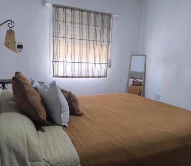 San Nicolas de los Arroyos Apartment | Geminis