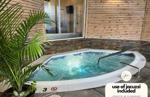 Norwich Villa | Getaway Villa- 3 mins to Mohegan- Fully Stocked with Two Full Beds & Fireplace- Jacuzzi, Saltwater Pools, Sauna