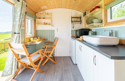 Howlett End House | Gin and Toffee is a beautifully restored railway carriage nestled in Thaxted