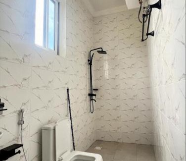 Kunduchi Apartment | GO VIP HOMES 10 minutes from beaches Secluded Cabin with Outdoor Dining Delight