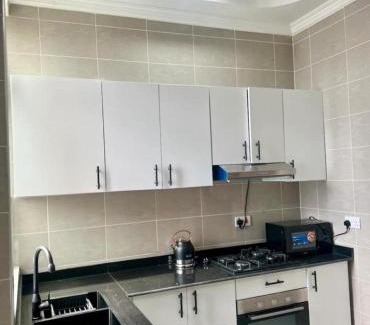 Kunduchi Apartment | GO VIP HOMES 10 minutes from beaches Secluded Cabin with Outdoor Dining Delight