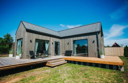 Mikeltornis House | Goba Sauleskempings