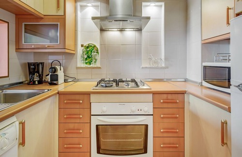 Cabanas Apartment | Golden 1 BDR Flat W/Balcony & Pool by LovelyStay