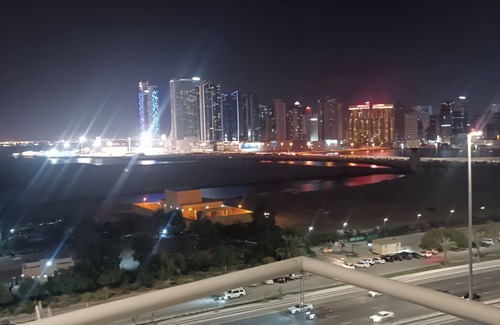 Al Hoora Apartment | Golden Oasis, a luxurious apartment with stunning partial sea & city views.