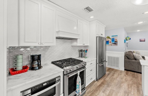 Venetian Way House | Gorgeous Beach House W/Large Outdoor Patio, Heated Pool & Gas Fire Pit!