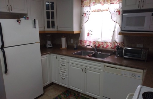 Dawson Creek House | Great location with ample parking makes this a great place to rest and relax.