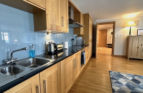 Brora Apartment | Ground floor 2-bedroom spacious apartment overlooking the famous James Braid Brora Golf Course.