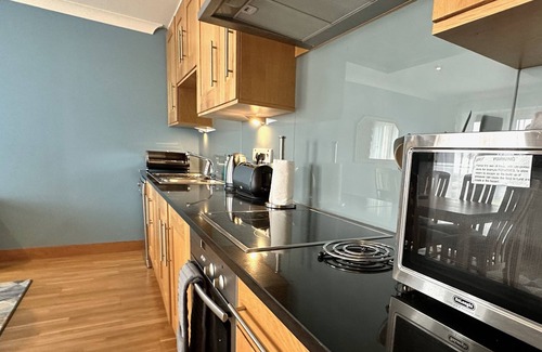 Brora Apartment | Ground floor 2-bedroom spacious apartment overlooking the famous James Braid Brora Golf Course.