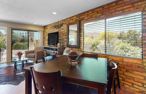 Carefree Condo | Ground-floor condo with on-site pool, grills, patio, & central AC