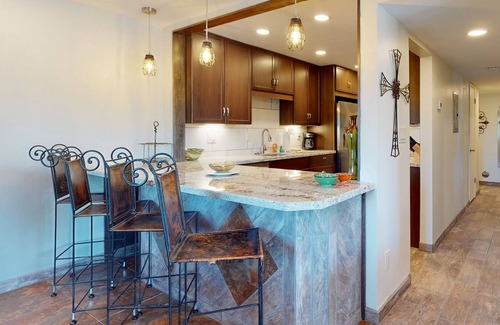 Carefree Condo | Ground-floor condo with on-site pool, grills, patio, & central AC