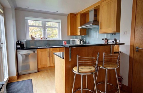 Brora Apartment | Ground floor 2-bedroom apartment overlooking the famous James Braid Brora Golf Course.