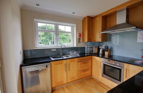 Brora Apartment | Ground floor 2-bedroom apartment overlooking the famous James Braid Brora Golf Course.