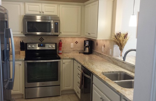 Geneva-on-the-Lake Condo | Ground Floor Lakefront Condo- Indoor Pool, Private Beach, Balcony