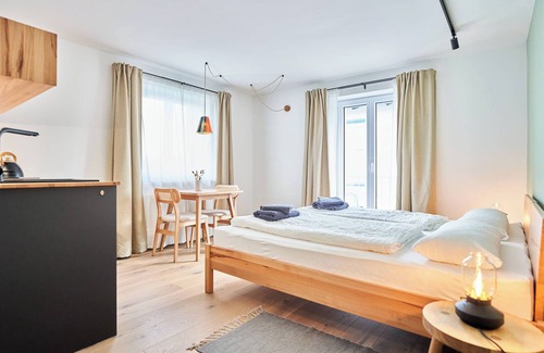 Bad Toelz House | Guest House 'Alte Seifensiederei - Jane' with Shared Terrace, Shared Garden and Wi-Fi