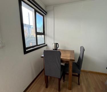 Cochrane Apartment | Habitación independiente con baño privado