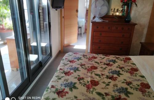 Burriana House | Habitacion Familiar en un Ático con gran terraza y,cocina ,en la playa