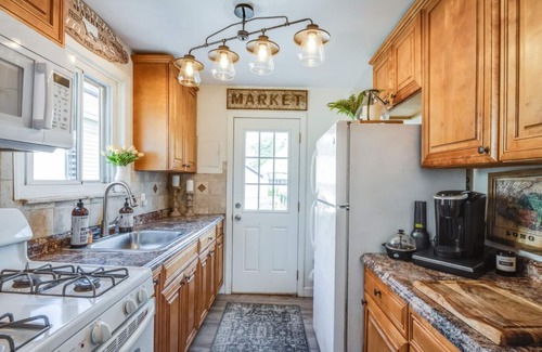 Copiague House | Harbor Water Views: Embrace the Tranquil Tide at this Oasis escape!