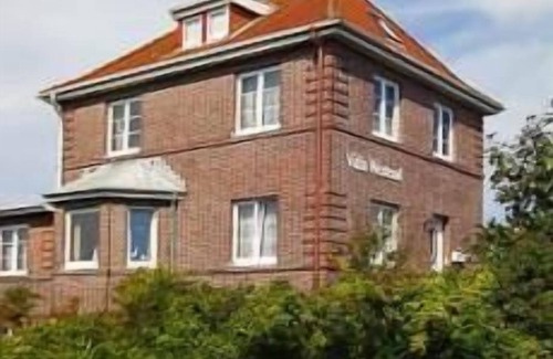 Langeoog Apartment | Helle Ferienwohnung auf Langeoog mit Gartennutzung für bis zu Vier Personen