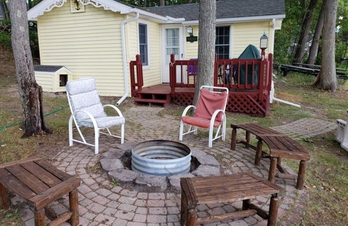 Higgins Lake House | Higgins Lakefront Cozy Beach House with Private Boat Mooring Onsite - Brass Bell