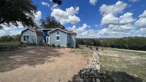 Oatmeal House | Hill Country Highland's Bluebonnet Cottage
