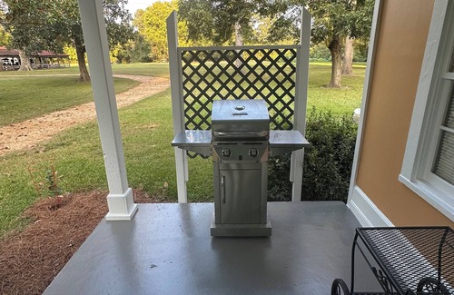 Natchez Cottage | Historic cottage privately situated on the grounds of the Foster Mounds.