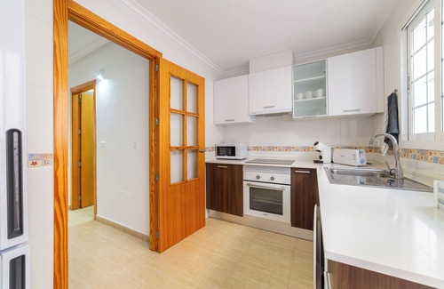 San Juan de los Terreros House | Holiday Home "Adosado El Invencible" with Sea View, Shared Pool & Wi-Fi