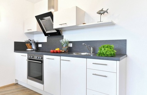 Enzisweiler Apartment | Holiday Apartment 'Dinkelbach Feriendomicil 2 B Flair' with Mountain View and Elevator